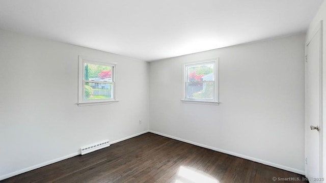 76 Midway Dr, Bethel, CT 06801 - empty room featuring a wealth of natural light, baseboards, dark wood-type flooring, and visible vents