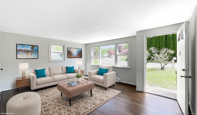 76 Midway Dr, Bethel, CT 06801 - living room with baseboard heating, wood finished floors, and baseboards