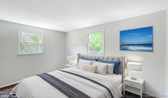76 Midway Dr, Bethel, CT 06801 - bedroom with baseboards and dark wood-type flooring