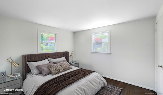 76 Midway Dr, Bethel, CT 06801 - bedroom with baseboards, multiple windows, and wood finished floors