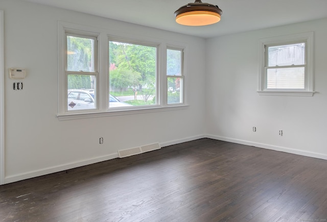 74 Midway Dr, Bethel, CT 06801 - empty room with dark wood finished floors and baseboards