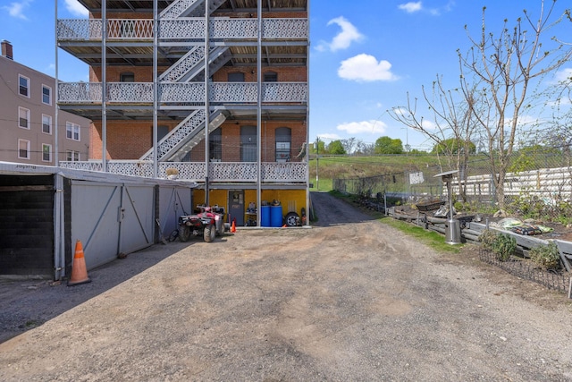 view of building exterior featuring stairs