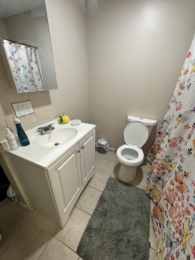 full bathroom with vanity, tile patterned flooring, toilet, and a shower with shower curtain