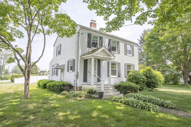 62 Lynde St, Old Saybrook, CT 06475 - view of front of home with a chimney