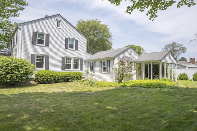 62 Lynde St, Old Saybrook, CT 06475 - rear view of property with a lawn