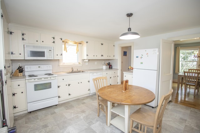 62 Lynde St, Old Saybrook, CT 06475 - kitchen featuring white appliances, light countertops, and white cabinetry