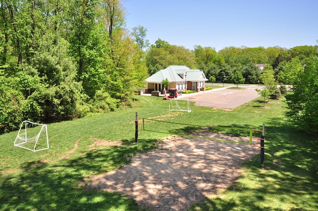 view of yard featuring a wooded view