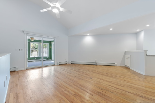 interior space with ceiling fan, light wood-style flooring, and a baseboard heating unit