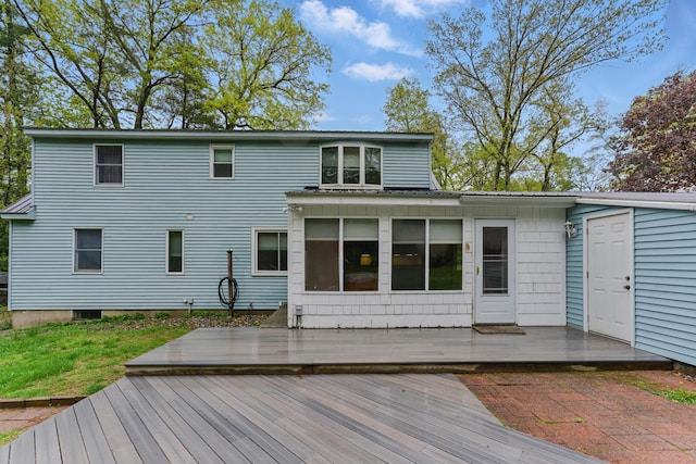 rear view of house with a deck