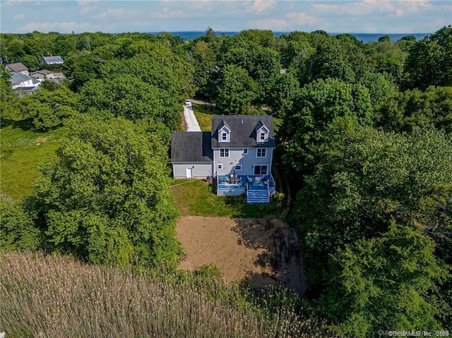 aerial view with a wooded view