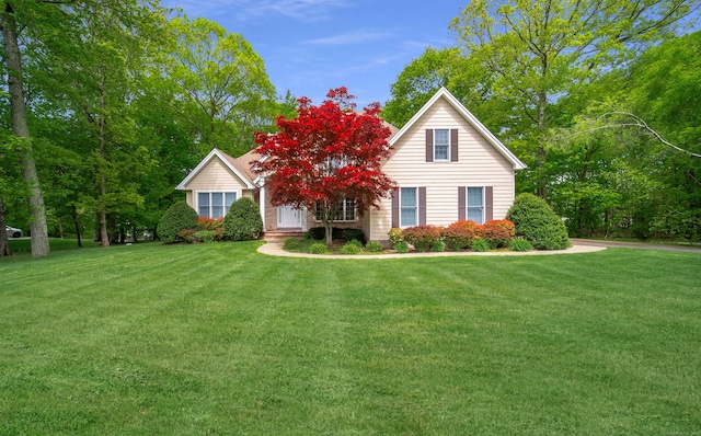 42 N Woods Rd, Hamden, CT 06518 - obstructed view of property featuring a front lawn