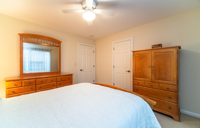 42 N Woods Rd, Hamden, CT 06518 - bedroom with light carpet, baseboards, and ceiling fan