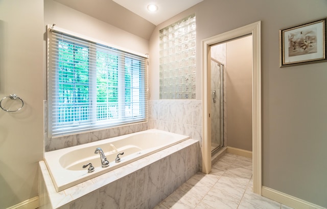 42 N Woods Rd, Hamden, CT 06518 - bathroom with baseboards, a stall shower, marble look tiles, and a bath