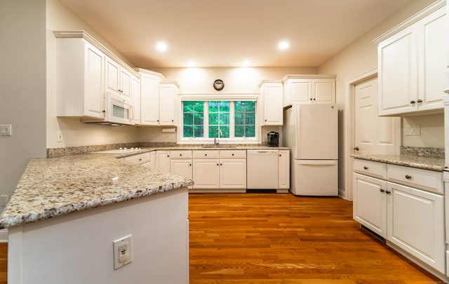 42 N Woods Rd, Hamden, CT 06518 - kitchen featuring white appliances, a sink, wood finished floors, white cabinetry, and recessed lighting