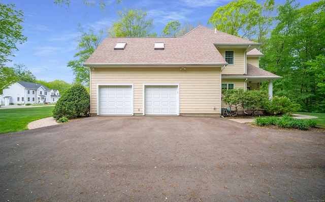 42 N Woods Rd, Hamden, CT 06518 - view of home's exterior with roof with shingles and asphalt driveway