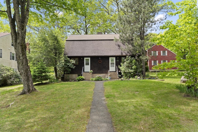 63 Schofield Rd Apt 60, Willington, CT 06279 - dutch colonial featuring entry steps, roof with shingles, a front yard, and a chimney
