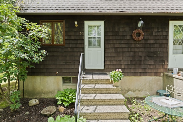 63 Schofield Rd Apt 60, Willington, CT 06279 - view of exterior entry with a shingled roof