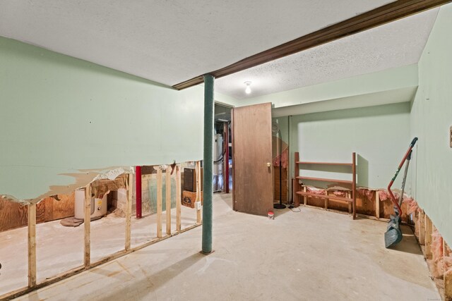 63 Schofield Rd Apt 60, Willington, CT 06279 - basement with a textured ceiling