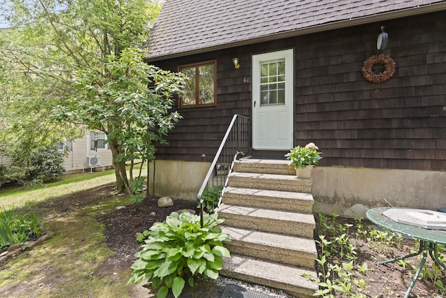 63 Schofield Rd Apt 60, Willington, CT 06279 - property entrance featuring a shingled roof