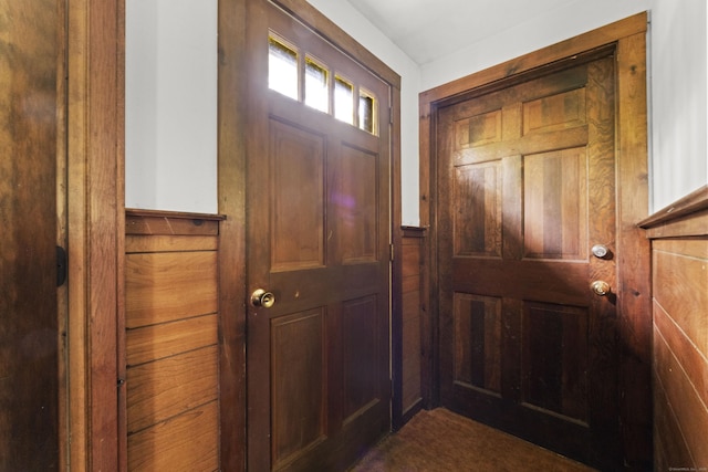 63 Schofield Rd Apt 60, Willington, CT 06279 - foyer entrance featuring wooden walls and a wainscoted wall