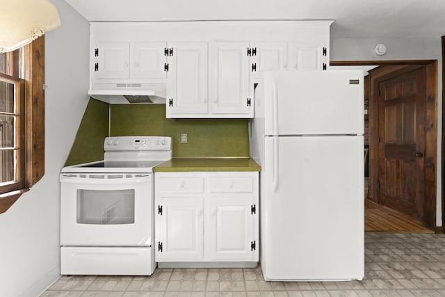 63 Schofield Rd Apt 60, Willington, CT 06279 - kitchen with white appliances, under cabinet range hood, white cabinetry, and light flooring