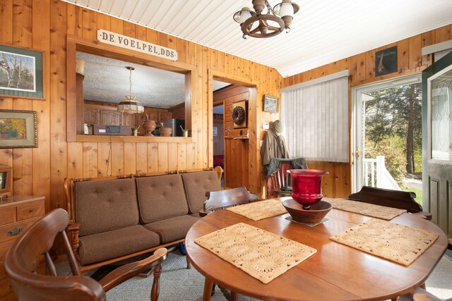 174 Bunker Hill Rd, Cornwall, CT 06796 - dining room with a chandelier and wooden walls