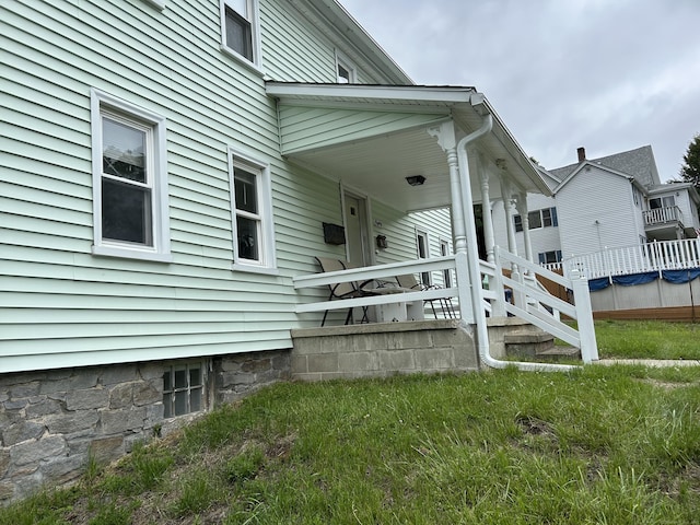 80 Colony St, Ansonia, CT 06401 - view of side of home featuring covered porch