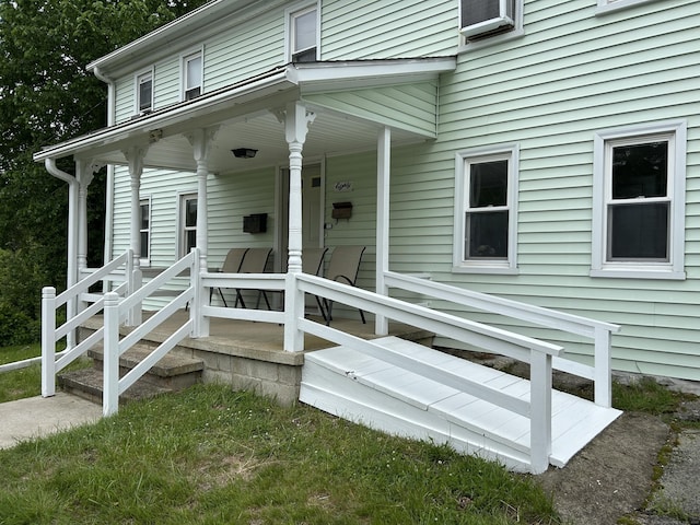 80 Colony St, Ansonia, CT 06401 - doorway to property with a porch