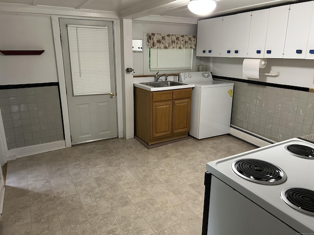 80 Colony St, Ansonia, CT 06401 - kitchen with washer / clothes dryer, white electric range, a sink, baseboard heating, and tile walls