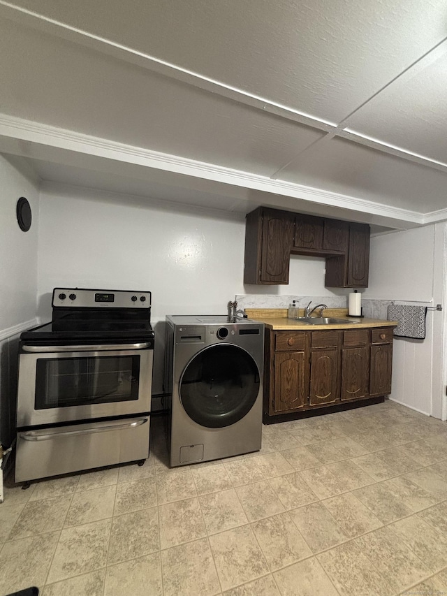 80 Colony St, Ansonia, CT 06401 - kitchen with washer / dryer, stainless steel electric range, dark brown cabinetry, light countertops, and a sink