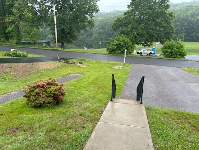 80 Colony St, Ansonia, CT 06401 - view of home's community featuring a lawn