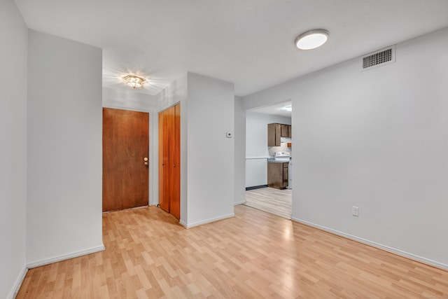 40 Woodsedge Dr Apt 2C, Newington, CT 06111 - unfurnished room with light wood finished floors and baseboards