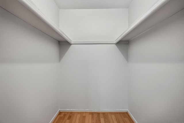 40 Woodsedge Dr Apt 2C, Newington, CT 06111 - walk in closet with light wood finished floors