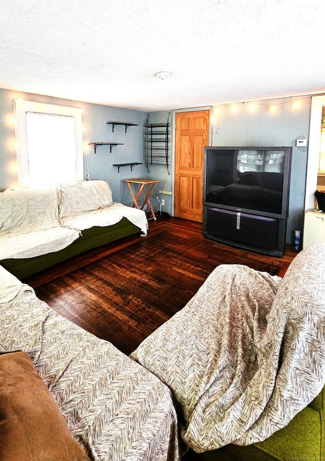 243 Bridge St, Groton, CT 06340 - living room with wood finished floors and a textured ceiling