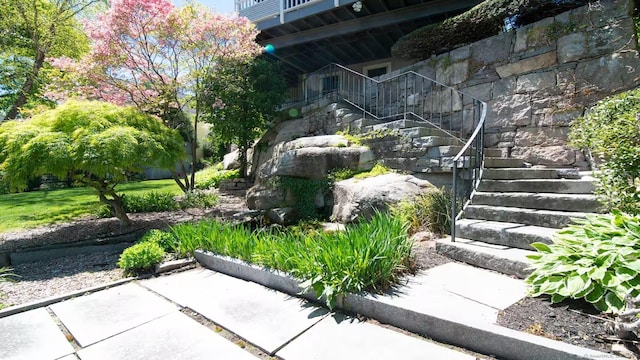 view of yard featuring stairway