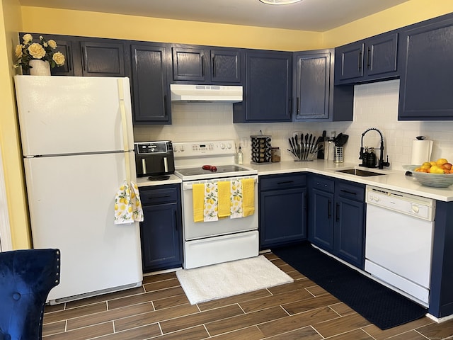 135 Bucks Hill Rd Apt 8, Waterbury, CT 06704 - kitchen featuring a sink, wood tiled floor, white appliances, under cabinet range hood, and light countertops