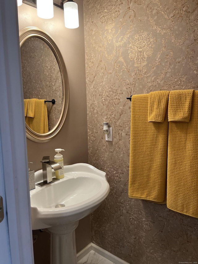 135 Bucks Hill Rd Apt 8, Waterbury, CT 06704 - bathroom with a sink, baseboards, and wallpapered walls