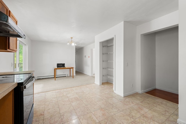 24 Fort Shantok Rd, Montville, CT 06382 - kitchen with light countertops, under cabinet range hood, a chandelier, black range with electric stovetop, and a baseboard radiator