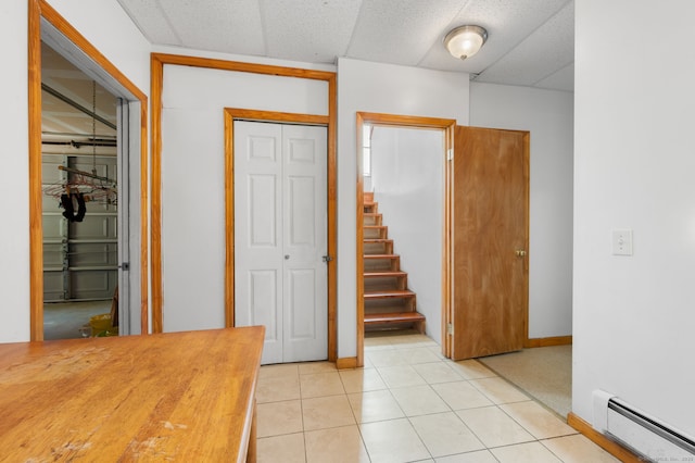 24 Fort Shantok Rd, Montville, CT 06382 - foyer featuring stairway, light tile patterned floors, a baseboard radiator, and baseboards
