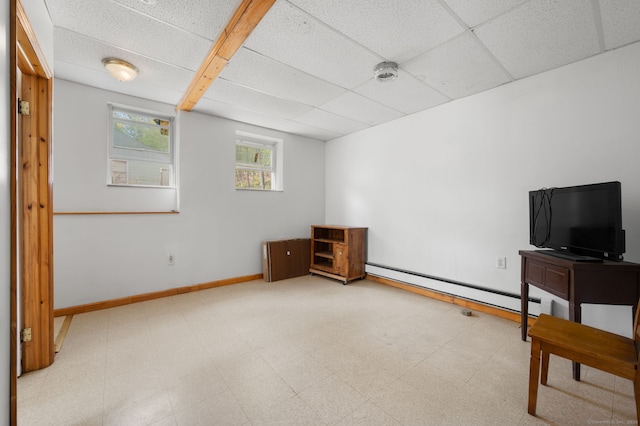 24 Fort Shantok Rd, Montville, CT 06382 - interior space featuring baseboards, a baseboard heating unit, tile patterned floors, and a paneled ceiling