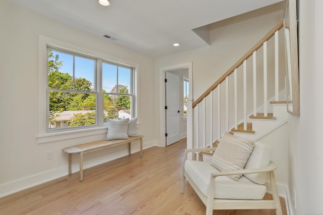 137 Millard St, Fairfield, CT 06824 - entrance foyer with recessed lighting, light wood-style floors, and stairway