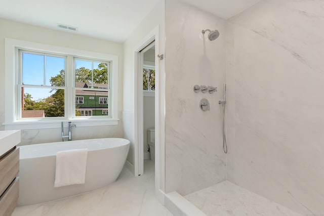 137 Millard St, Fairfield, CT 06824 - bathroom featuring a marble finish shower, a freestanding bath, plenty of natural light, and vanity