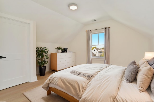 137 Millard St, Fairfield, CT 06824 - bedroom with light wood-style floors and vaulted ceiling