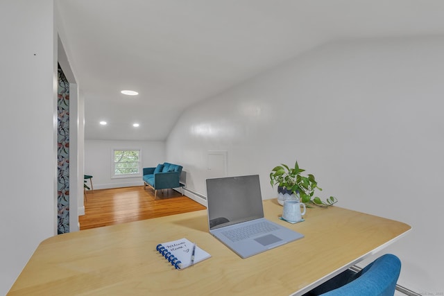 office area with wood finished floors, a baseboard radiator, lofted ceiling, and recessed lighting