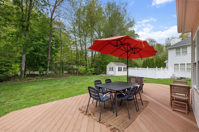 9 Baldwin Dr, Farmington, CT 06032 - wooden terrace featuring outdoor dining space, a shed, and an outdoor structure