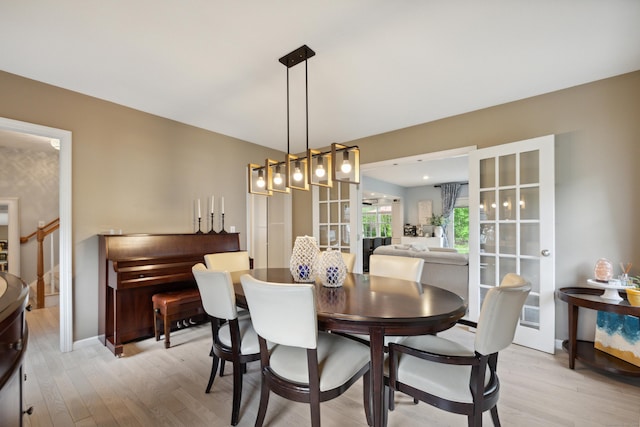 9 Baldwin Dr, Farmington, CT 06032 - dining space with light wood-type flooring, baseboards, and stairway
