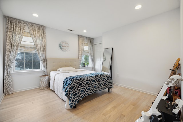 9 Baldwin Dr, Farmington, CT 06032 - bedroom featuring wood finished floors, recessed lighting, and baseboards