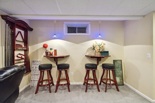 9 Baldwin Dr, Farmington, CT 06032 - indoor dry bar with a paneled ceiling, carpet flooring, baseboards, and hanging light fixtures