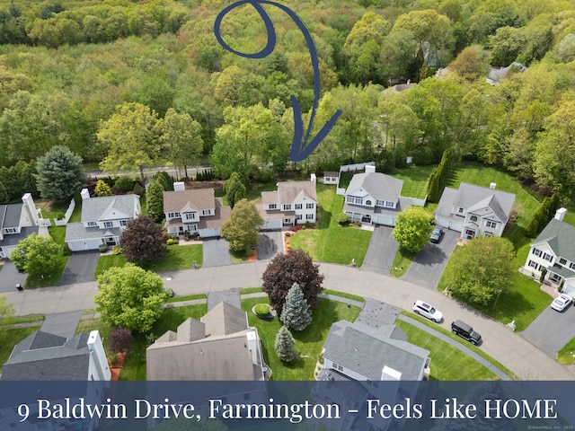 9 Baldwin Dr, Farmington, CT 06032 - aerial perspective of suburban area with a heavily wooded area