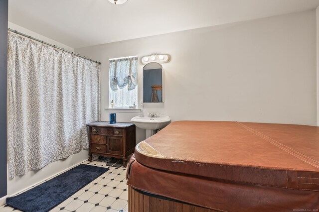full bath with tile patterned floors